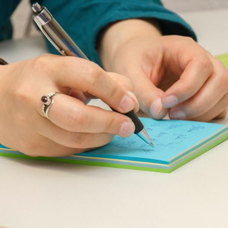 Persona che prende appunti